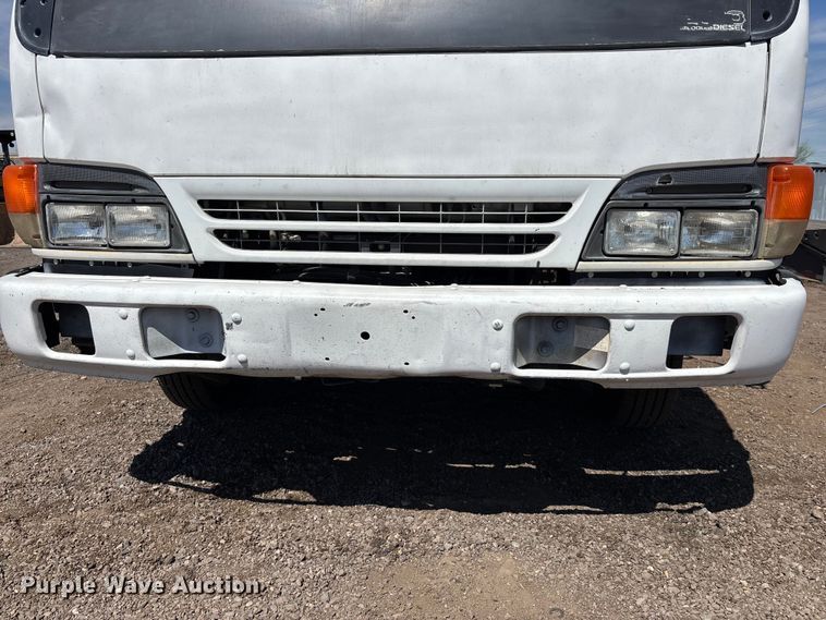 image for item DW1297 1999 Isuzu NPR flatbed truck