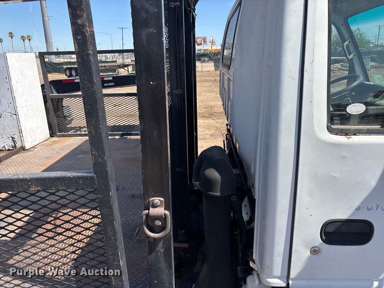 image for item DW1297 1999 Isuzu NPR flatbed truck