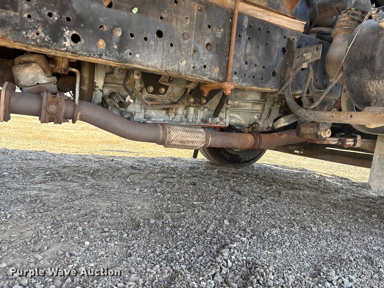 image for item DW1297 1999 Isuzu NPR flatbed truck