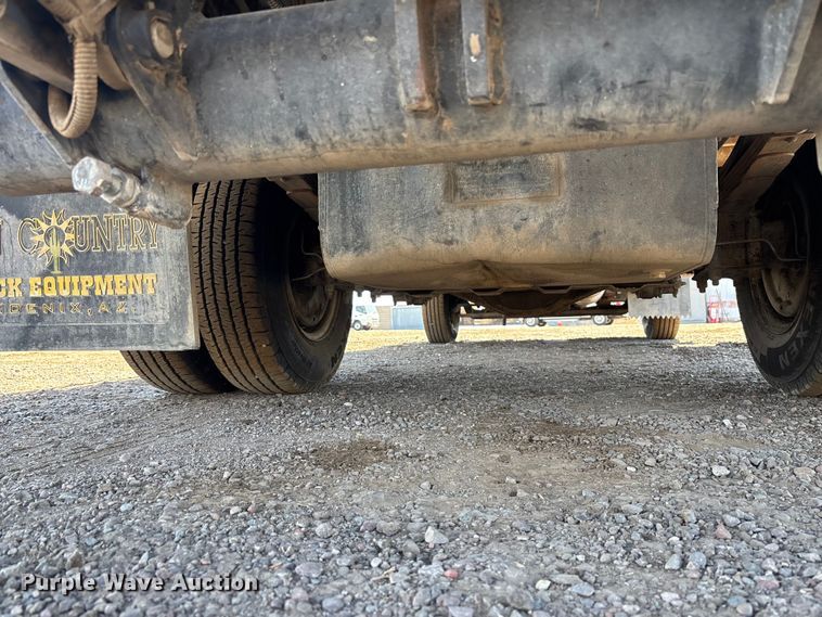 image for item DW1297 1999 Isuzu NPR flatbed truck