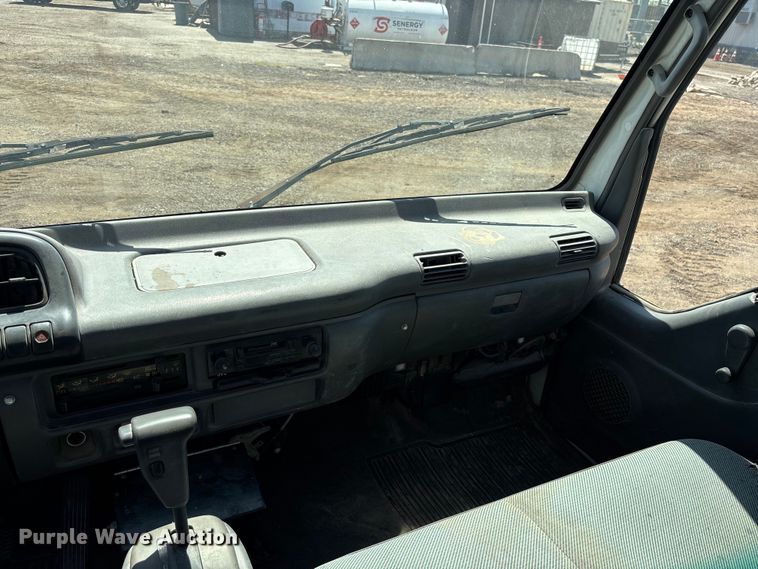 image for item DW1297 1999 Isuzu NPR flatbed truck