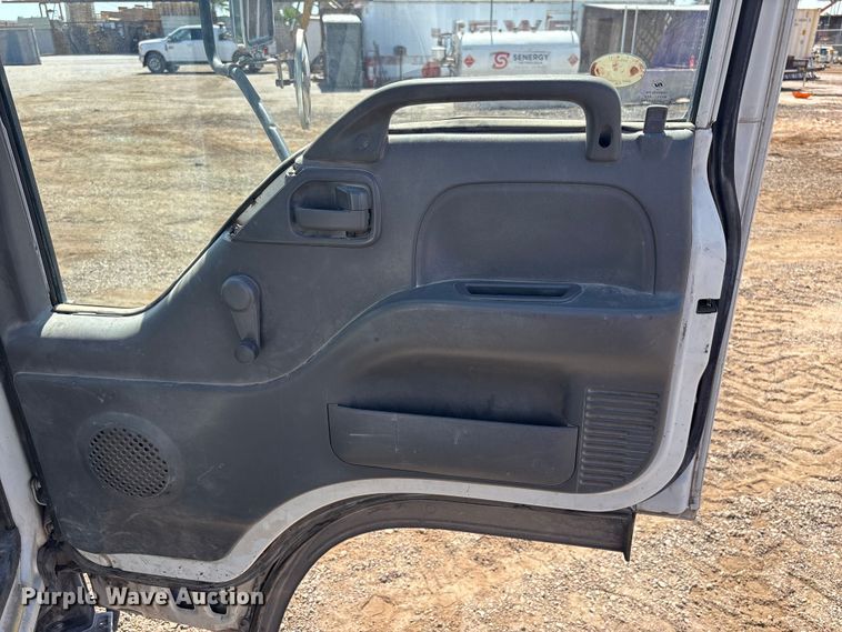 image for item DW1297 1999 Isuzu NPR flatbed truck