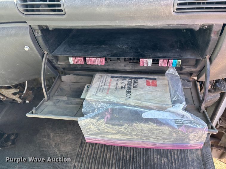 image for item DW1297 1999 Isuzu NPR flatbed truck