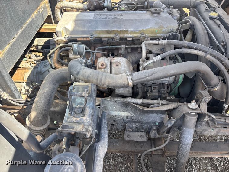 image for item DW1297 1999 Isuzu NPR flatbed truck