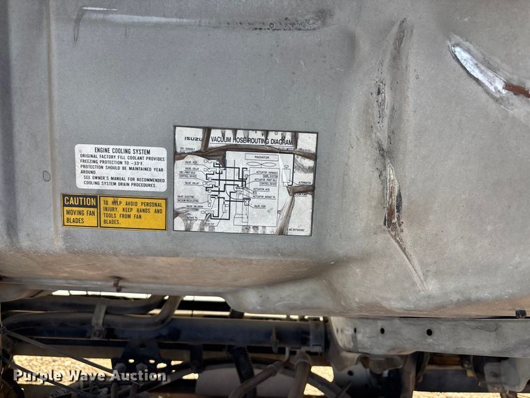 image for item DW1297 1999 Isuzu NPR flatbed truck