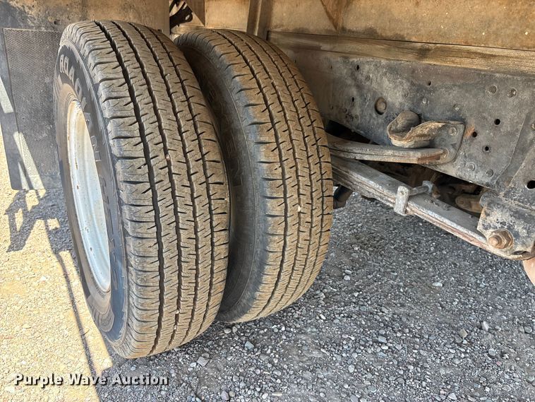 image for item DW1297 1999 Isuzu NPR flatbed truck