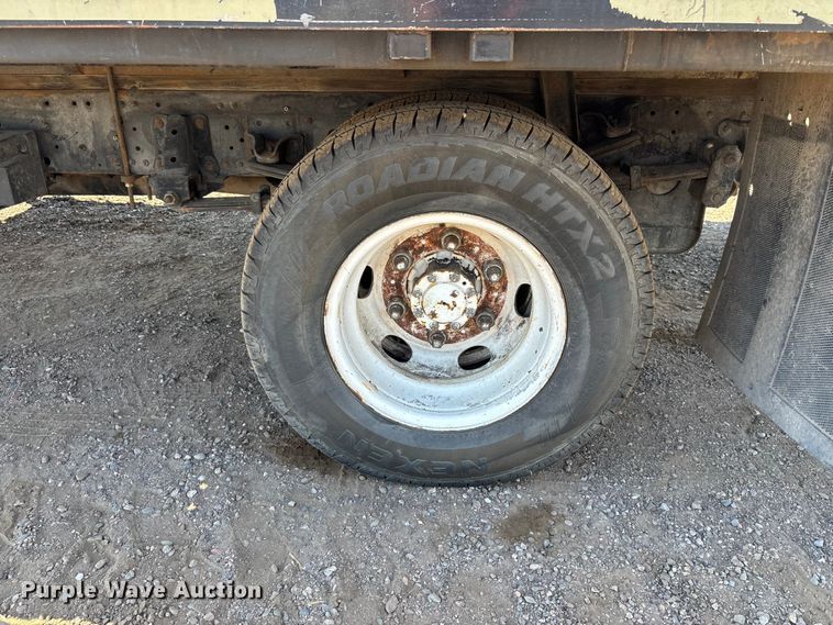 image for item DW1297 1999 Isuzu NPR flatbed truck