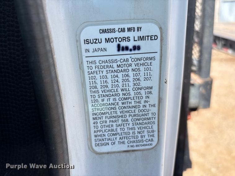 image for item DW1297 1999 Isuzu NPR flatbed truck