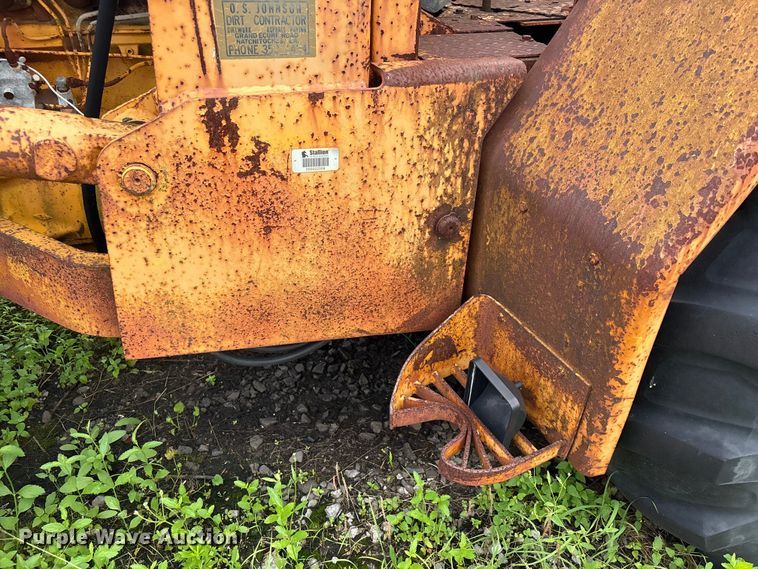 image for item EA7303 John Deere 410 backhoe