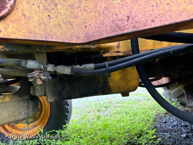 image for item EA7303 John Deere 410 backhoe