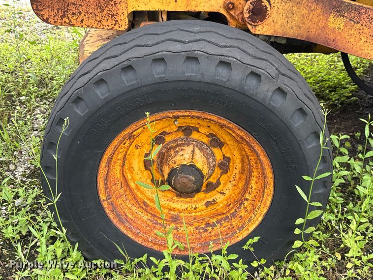 image for item EA7303 John Deere 410 backhoe