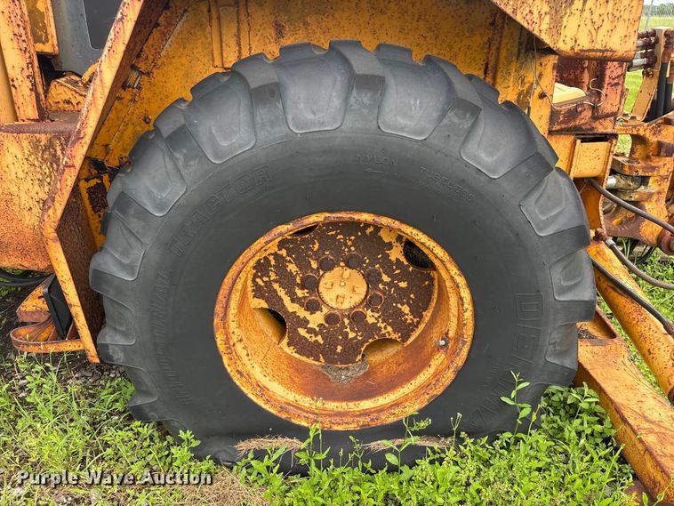 image for item EA7303 John Deere 410 backhoe