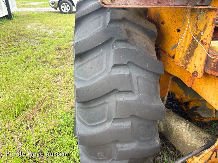 image for item EA7303 John Deere 410 backhoe
