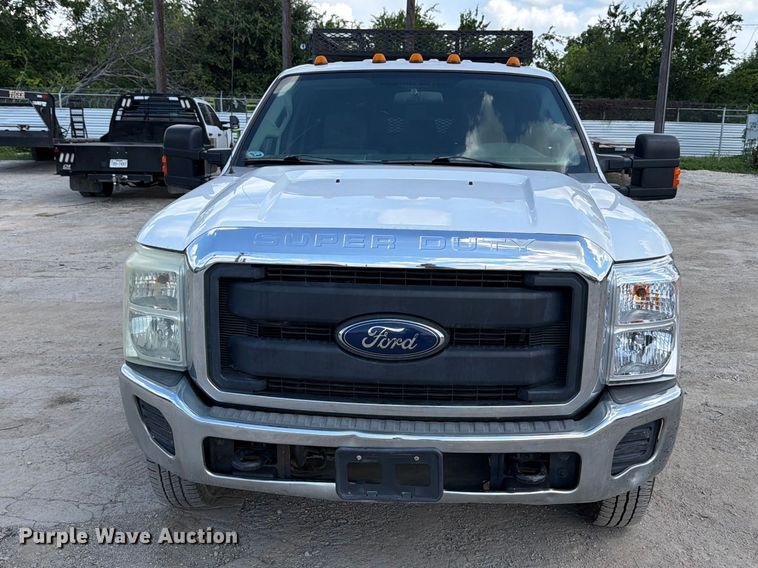 image for item ED5297 2015 Ford F350 Super Duty Crew Cab utility bed pickup truck