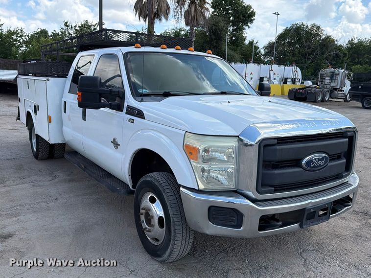 image for item ED5297 2015 Ford F350 Super Duty Crew Cab utility bed pickup truck