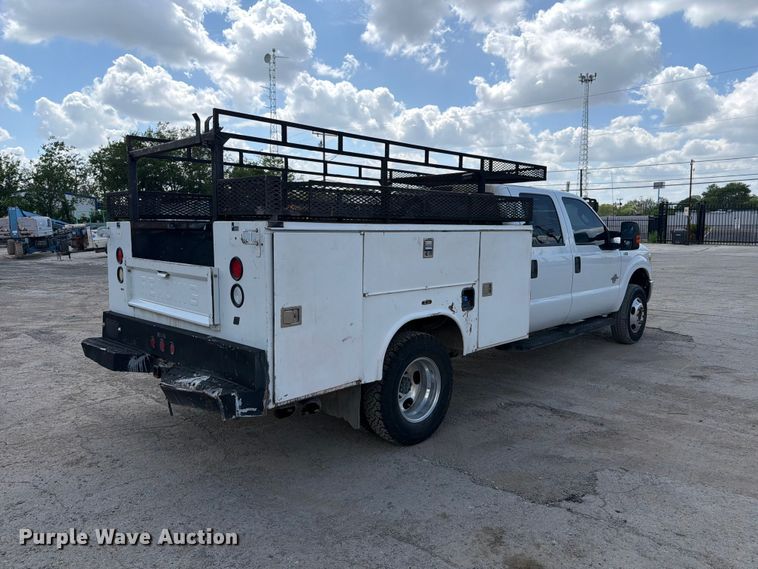 image for item ED5297 2015 Ford F350 Super Duty Crew Cab utility bed pickup truck