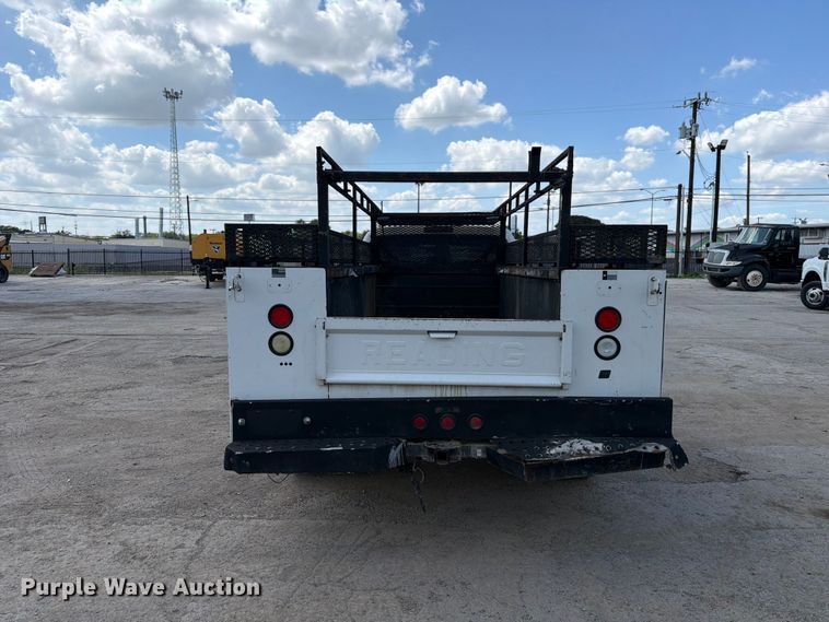 image for item ED5297 2015 Ford F350 Super Duty Crew Cab utility bed pickup truck