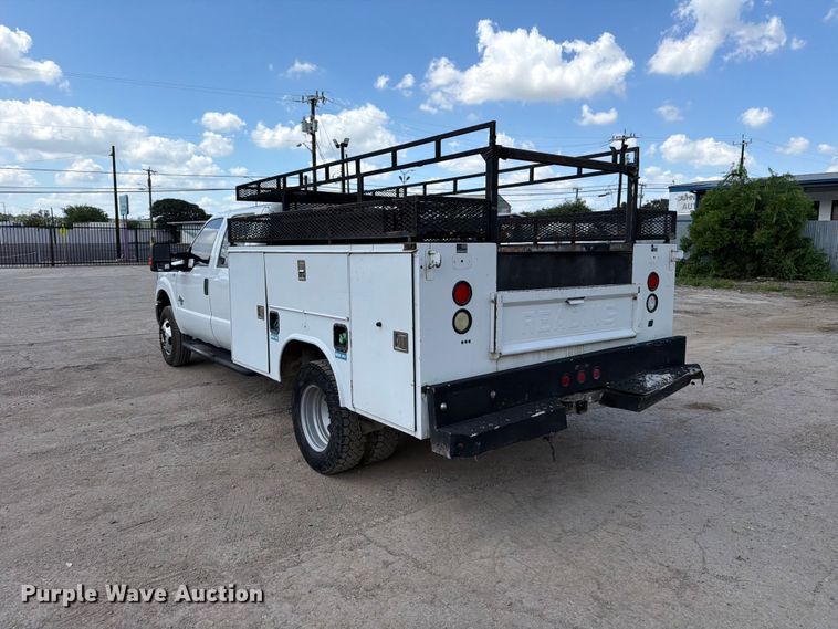 image for item ED5297 2015 Ford F350 Super Duty Crew Cab utility bed pickup truck