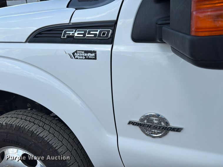image for item ED5297 2015 Ford F350 Super Duty Crew Cab utility bed pickup truck
