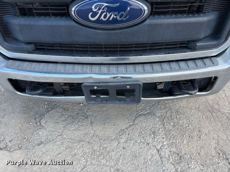 image for item ED5297 2015 Ford F350 Super Duty Crew Cab utility bed pickup truck