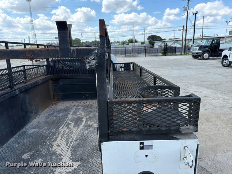 image for item ED5297 2015 Ford F350 Super Duty Crew Cab utility bed pickup truck