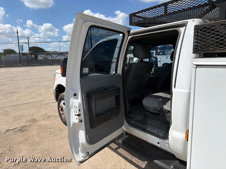 image for item ED5297 2015 Ford F350 Super Duty Crew Cab utility bed pickup truck