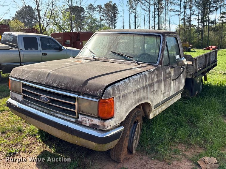 1990 Ford F250 flatbed pickup truck