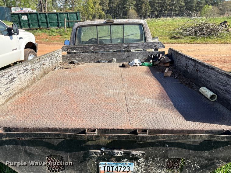 image for item EF1062 1990 Ford F250 flatbed pickup truck