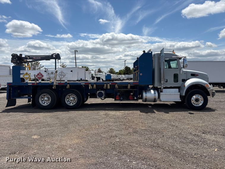 image for item EG9065 2017 Peterbilt 348 flatbed truck