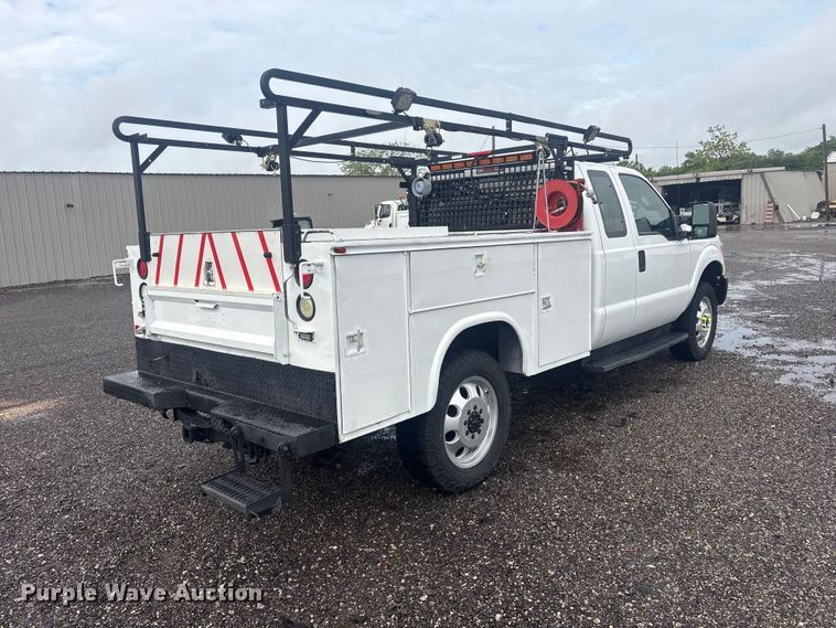 image for item EG9114 2015 Ford F350 Super Duty Ext. Cab utility bed pickup truck
