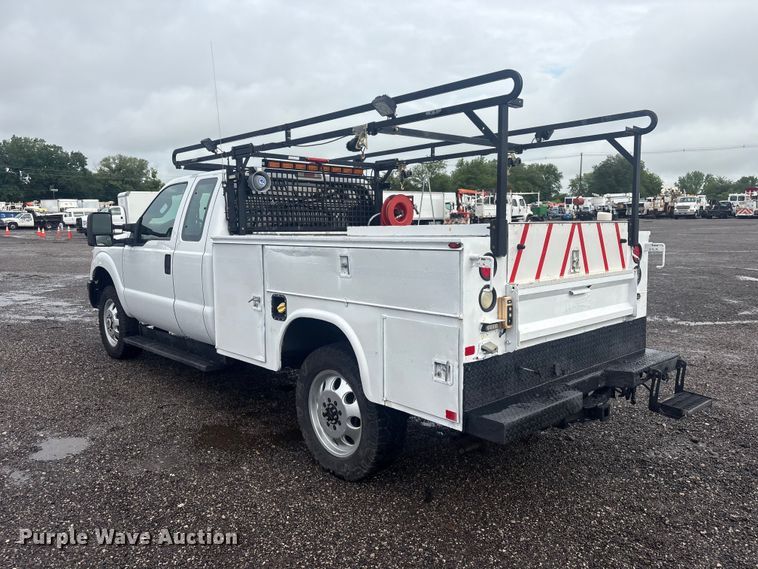 image for item EG9114 2015 Ford F350 Super Duty Ext. Cab utility bed pickup truck