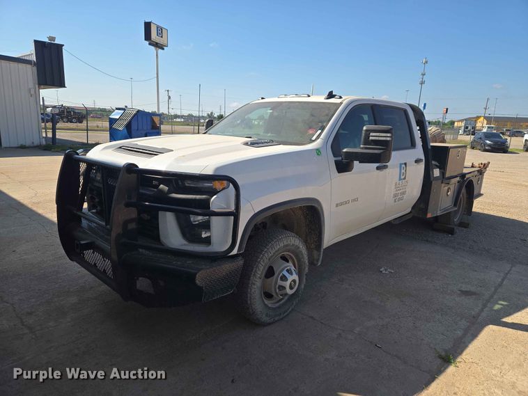 image for item EW0203 2022 Chevrolet Silverado 3500HD Crew Cab flatbed pickup truck