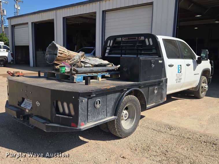 image for item EW0203 2022 Chevrolet Silverado 3500HD Crew Cab flatbed pickup truck