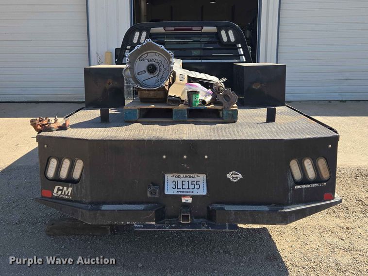 image for item EW0203 2022 Chevrolet Silverado 3500HD Crew Cab flatbed pickup truck
