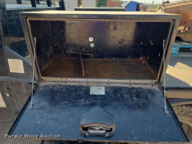 image for item EW0203 2022 Chevrolet Silverado 3500HD Crew Cab flatbed pickup truck