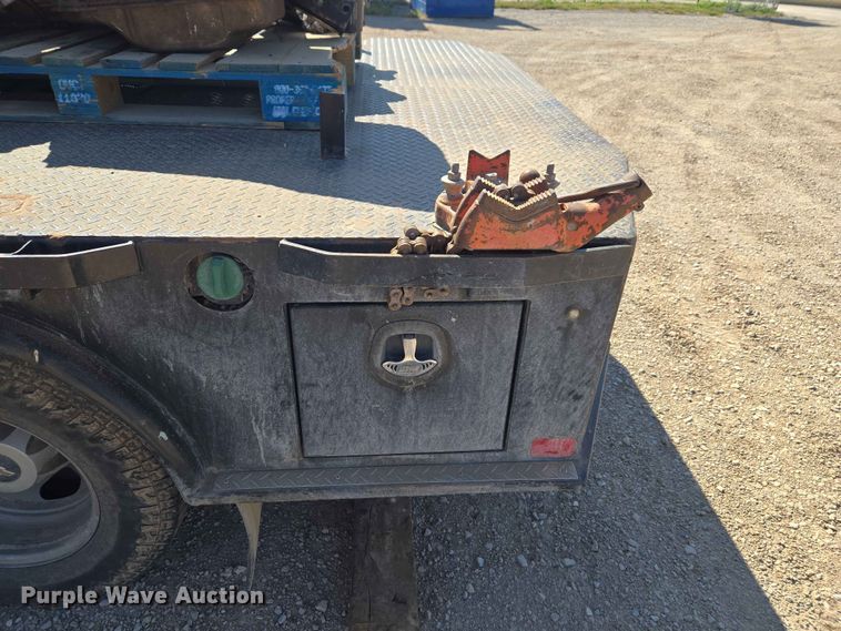 image for item EW0203 2022 Chevrolet Silverado 3500HD Crew Cab flatbed pickup truck