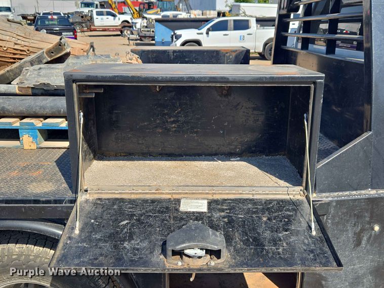 image for item EW0203 2022 Chevrolet Silverado 3500HD Crew Cab flatbed pickup truck