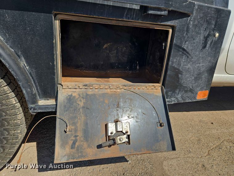 image for item EW0203 2022 Chevrolet Silverado 3500HD Crew Cab flatbed pickup truck