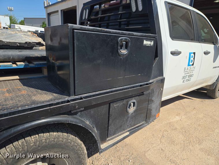 image for item EW0203 2022 Chevrolet Silverado 3500HD Crew Cab flatbed pickup truck