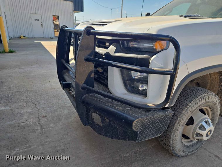 image for item EW0203 2022 Chevrolet Silverado 3500HD Crew Cab flatbed pickup truck