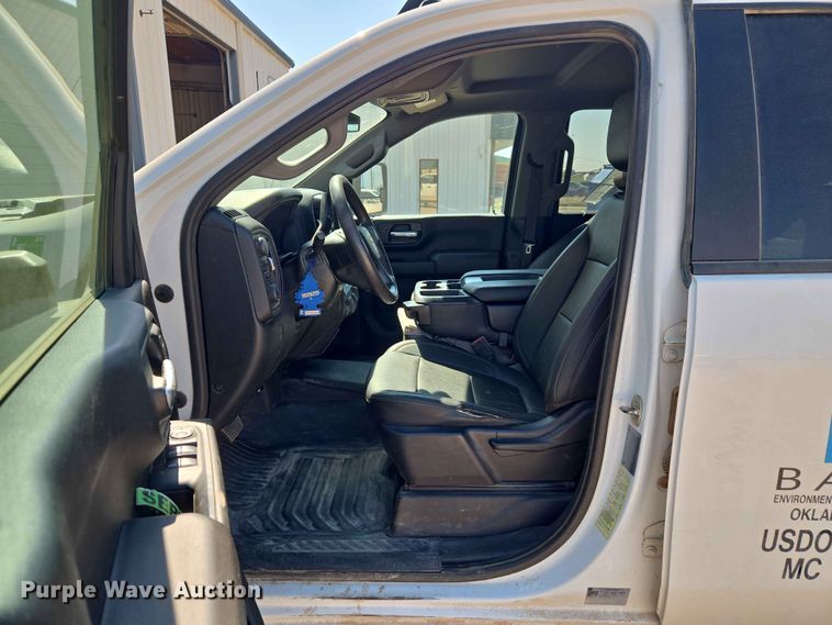 image for item EW0203 2022 Chevrolet Silverado 3500HD Crew Cab flatbed pickup truck