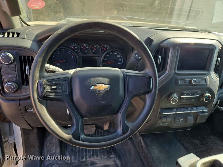 image for item EW0203 2022 Chevrolet Silverado 3500HD Crew Cab flatbed pickup truck