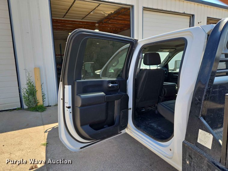 image for item EW0203 2022 Chevrolet Silverado 3500HD Crew Cab flatbed pickup truck