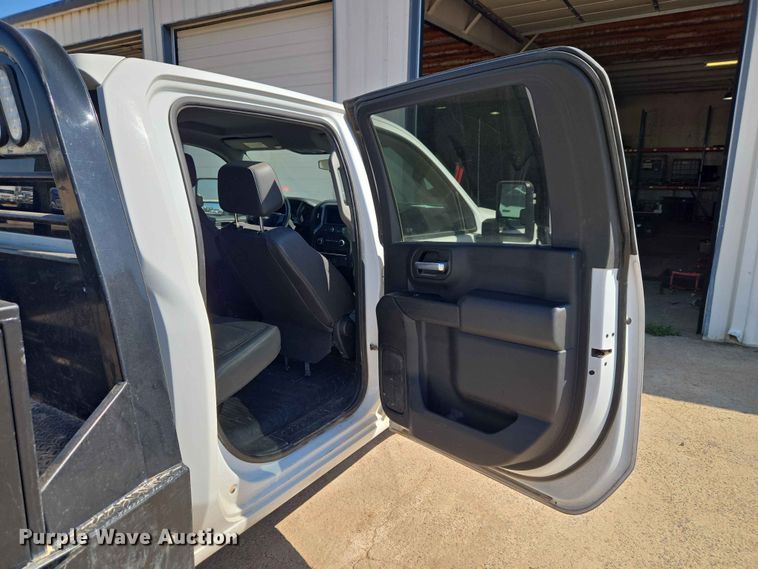 image for item EW0203 2022 Chevrolet Silverado 3500HD Crew Cab flatbed pickup truck