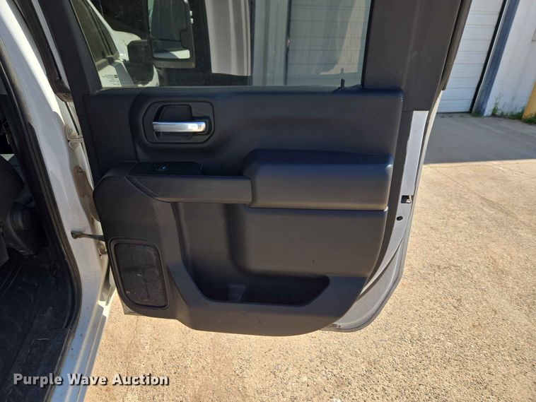image for item EW0203 2022 Chevrolet Silverado 3500HD Crew Cab flatbed pickup truck