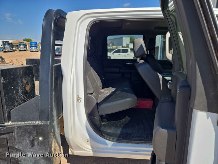 image for item EW0203 2022 Chevrolet Silverado 3500HD Crew Cab flatbed pickup truck