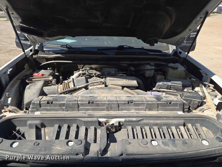 image for item EW0203 2022 Chevrolet Silverado 3500HD Crew Cab flatbed pickup truck