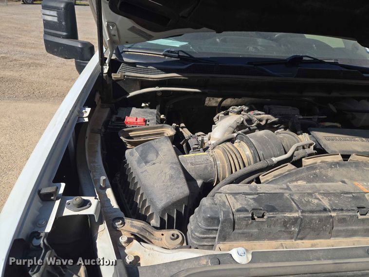 image for item EW0203 2022 Chevrolet Silverado 3500HD Crew Cab flatbed pickup truck