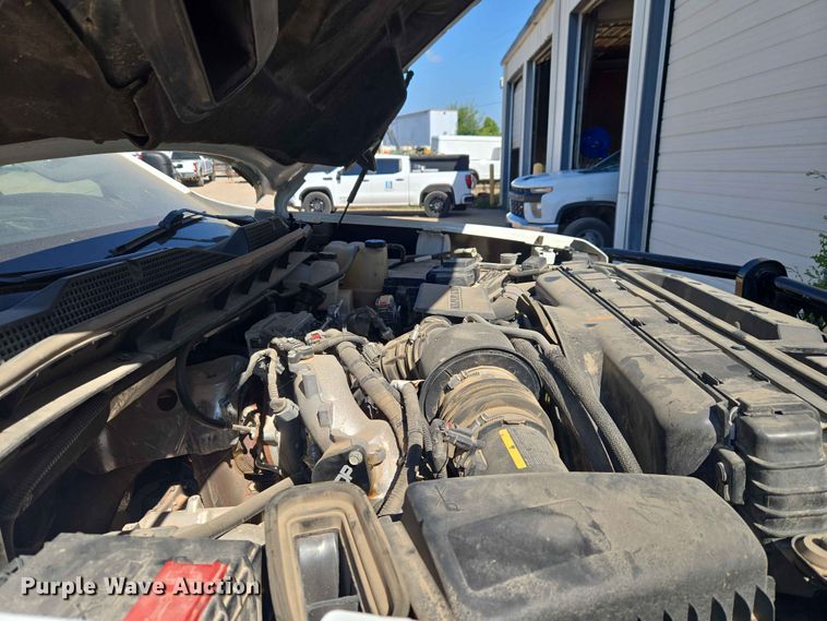 image for item EW0203 2022 Chevrolet Silverado 3500HD Crew Cab flatbed pickup truck