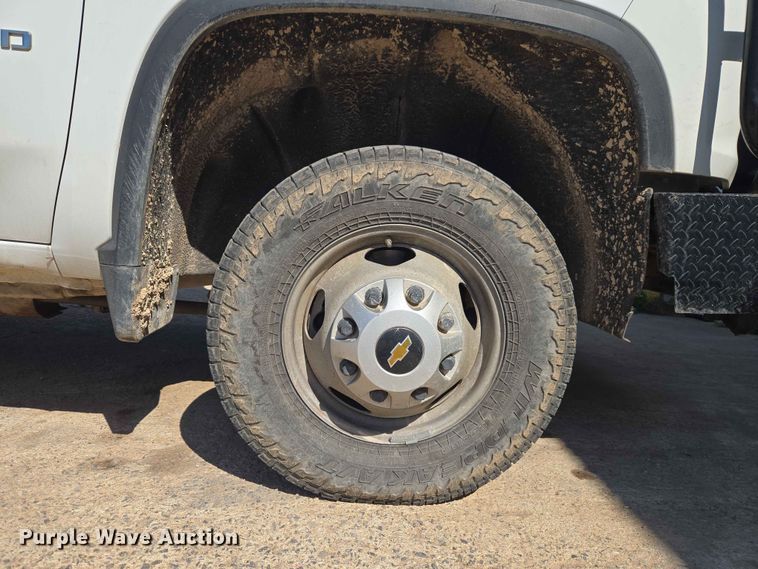 image for item EW0203 2022 Chevrolet Silverado 3500HD Crew Cab flatbed pickup truck